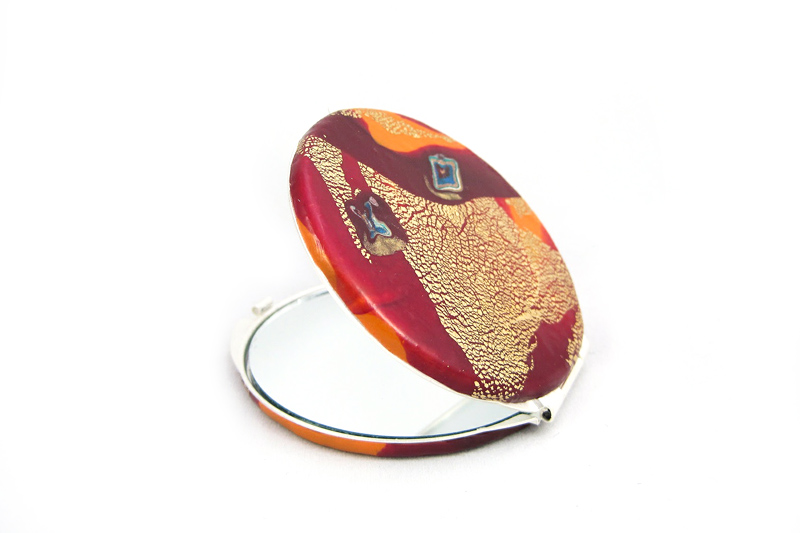 espejo-fuego-800x533 espejo de bolso fuego