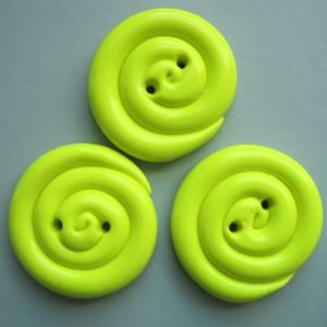 botones amarillo espiral